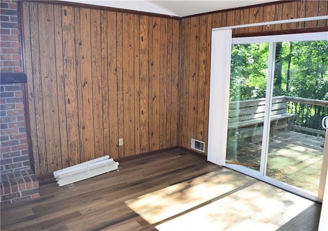 157 Sequoyah Cir, Canton, GA 30115 - spare room with dark wood finished floors, wooden walls, and lofted ceiling