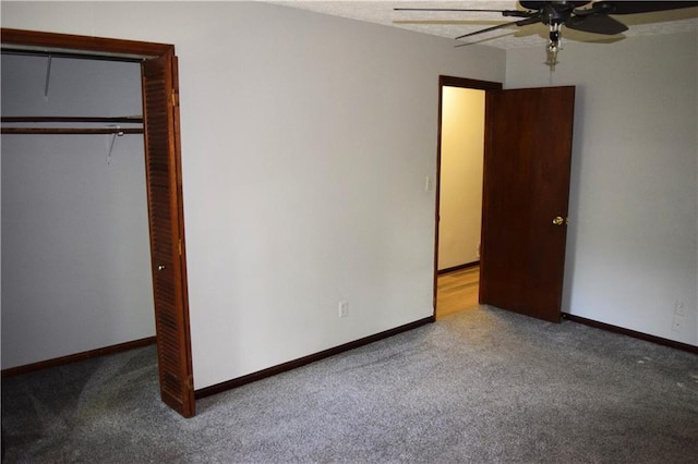 157 Sequoyah Cir, Canton, GA 30115 - unfurnished bedroom with carpet floors, a closet, baseboards, and a ceiling fan