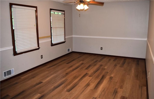 157 Sequoyah Cir, Canton, GA 30115 - unfurnished room featuring ceiling fan, wood finished floors, and baseboards