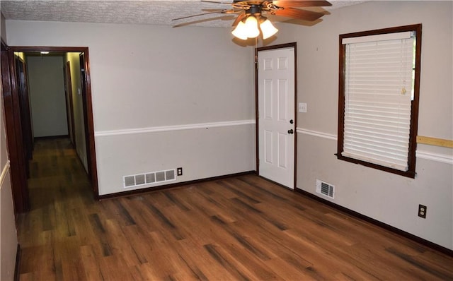 157 Sequoyah Cir, Canton, GA 30115 - empty room with ceiling fan, wood finished floors, baseboards, and a textured ceiling