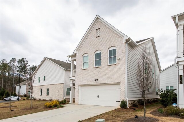 3739 Silvery Way, Powder Springs, GA 30127 - view of property exterior with concrete driveway, a garage, and brick siding