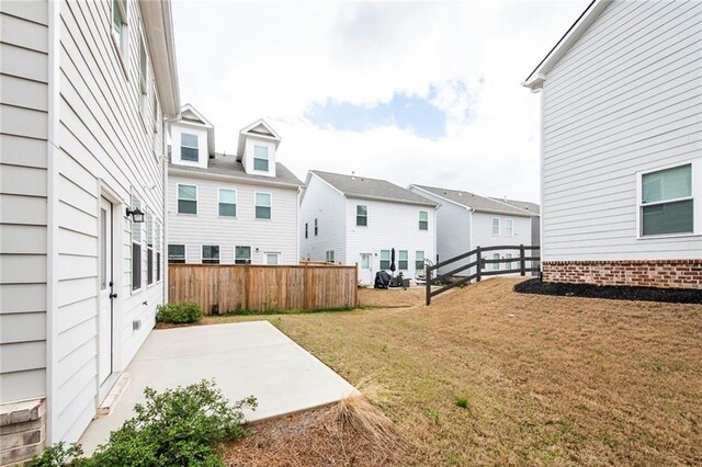 3739 Silvery Way, Powder Springs, GA 30127 - view of yard featuring a residential view, fence, and a patio area