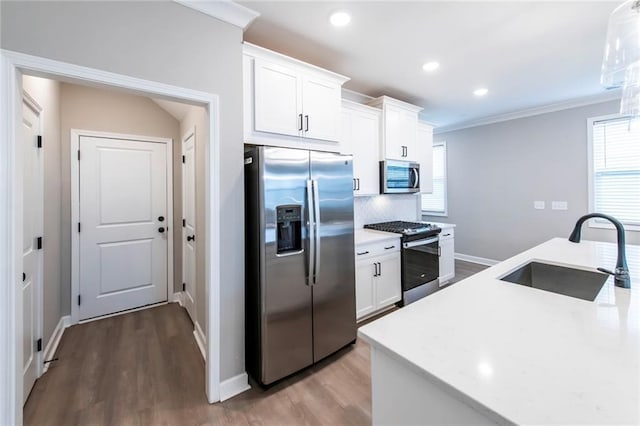 3739 Silvery Way, Powder Springs, GA 30127 - kitchen featuring light countertops, a wealth of natural light, appliances with stainless steel finishes, and a sink