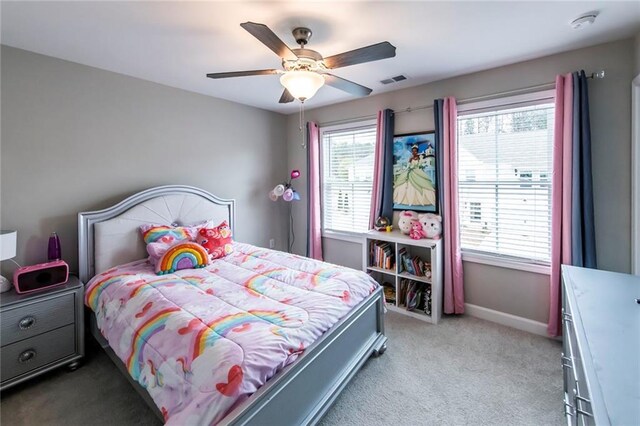 3739 Silvery Way, Powder Springs, GA 30127 - bedroom featuring visible vents, multiple windows, light colored carpet, and ceiling fan