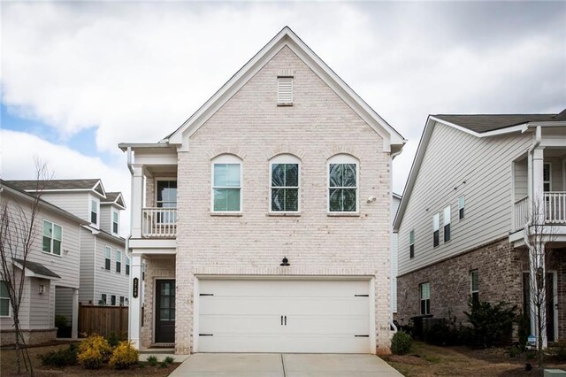 3739 Silvery Way, Powder Springs, GA 30127 - view of front of property featuring brick siding, an attached garage, and concrete driveway