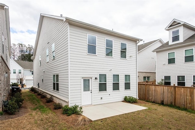 3739 Silvery Way, Powder Springs, GA 30127 - rear view of house featuring a patio, fence, and a lawn