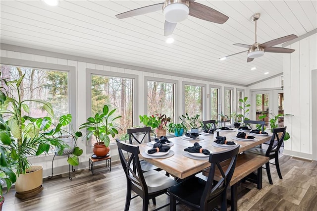 sunroom featuring wooden ceiling and vaulted ceiling