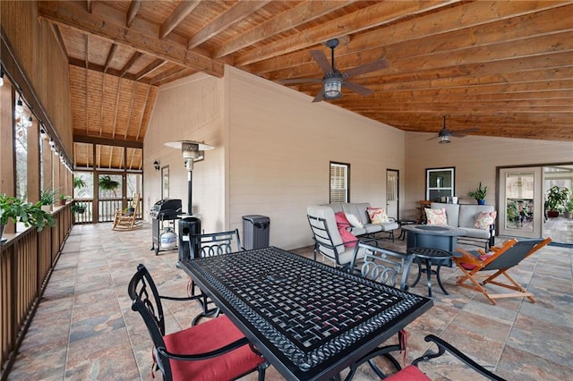 view of patio / terrace featuring a ceiling fan, outdoor dining area, and an outdoor living space