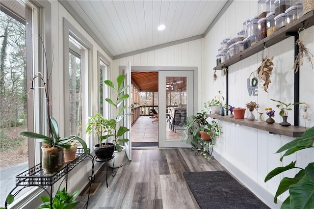 entryway with lofted ceiling, wood ceiling, wood finished floors, and a sunroom