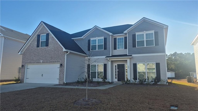 view of front of house featuring central AC and a garage