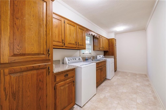 6141 Windsong Way, Smoke Rise, GA 30087 - laundry area featuring cabinet space, ornamental molding, washing machine and clothes dryer, a textured ceiling, and baseboards