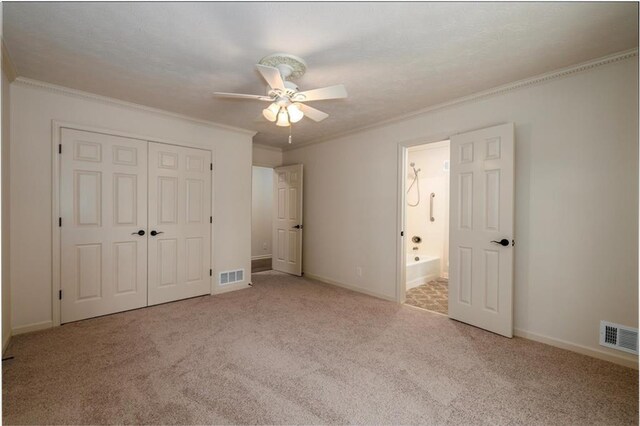 6141 Windsong Way, Smoke Rise, GA 30087 - unfurnished bedroom with two closets, carpet floors, crown molding, baseboards, and ceiling fan