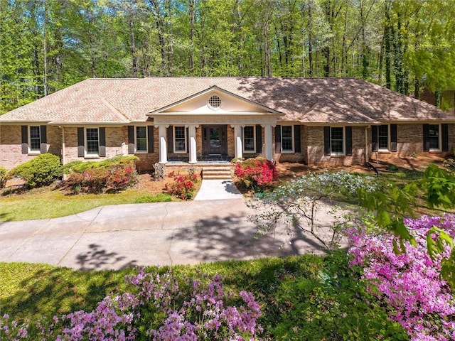 6141 Windsong Way, Smoke Rise, GA 30087 - view of front facade with covered porch