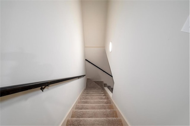 6141 Windsong Way, Smoke Rise, GA 30087 - staircase with baseboards