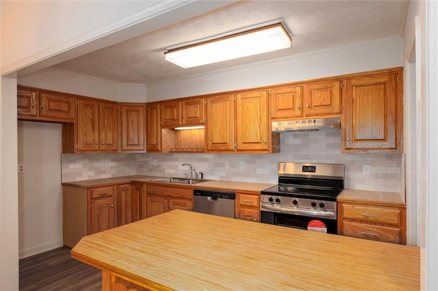 6141 Windsong Way, Smoke Rise, GA 30087 - kitchen with stainless steel appliances, under cabinet range hood, a sink, light countertops, and backsplash