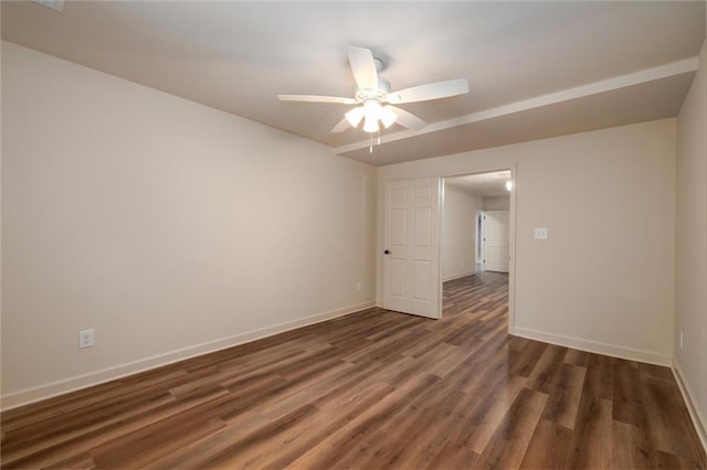 6141 Windsong Way, Smoke Rise, GA 30087 - empty room with wood finished floors, a ceiling fan, and baseboards