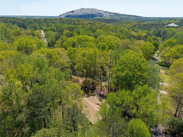 6141 Windsong Way, Smoke Rise, GA 30087 - drone / aerial view of a heavily wooded area and a mountain backdrop