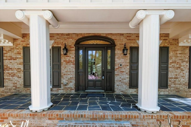 6141 Windsong Way, Smoke Rise, GA 30087 - doorway to property with a porch and brick siding