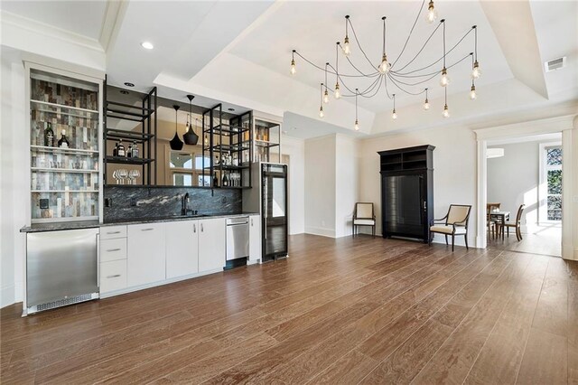 dining space with crown molding, baseboards, stairway, french doors, and dark wood-style floors