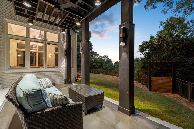 rear view of house with stairs, a deck, a patio area, and brick siding