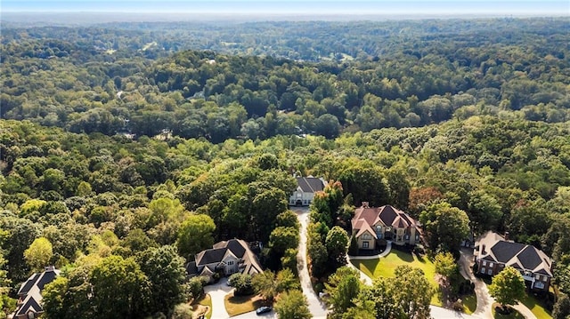 aerial view featuring a forest view