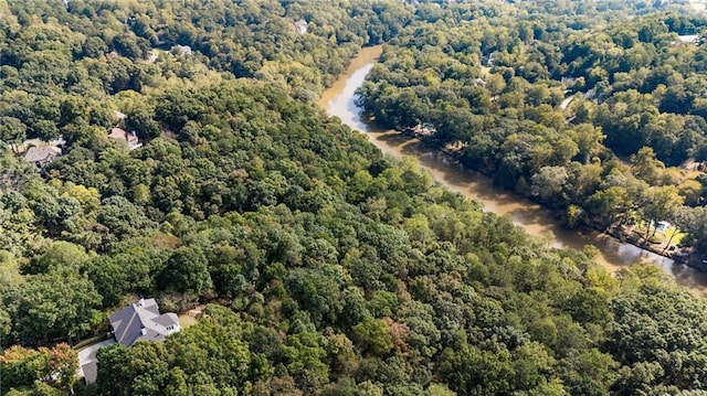 aerial view featuring a view of trees