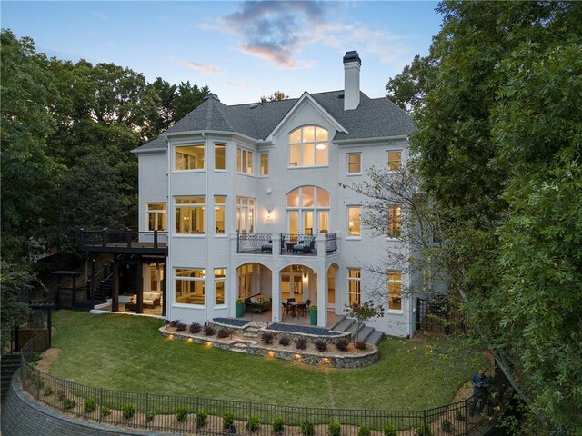 birds eye view of property with a wooded view