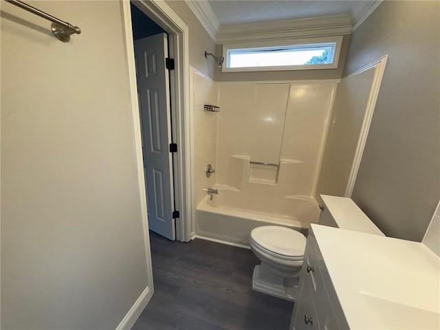 full bath featuring crown molding, toilet, wood finished floors, and shower / bath combination