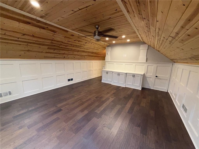 bonus room with ceiling fan, dark wood-type flooring, wood ceiling, and vaulted ceiling