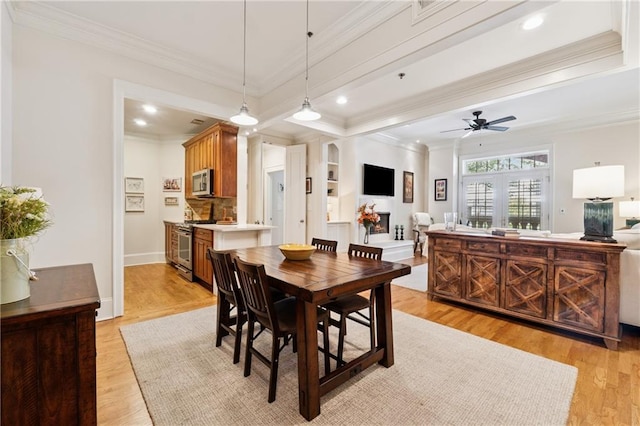 77 Peachtree Pl NE Unit 101, Atlanta, GA 30309 - dining room with crown molding, light wood-style floors, a ceiling fan, and recessed lighting