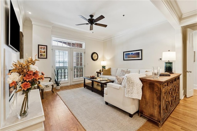 77 Peachtree Pl NE Unit 101, Atlanta, GA 30309 - living area featuring ornamental molding, ceiling fan, and light wood-type flooring