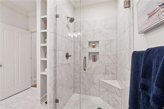 77 Peachtree Pl NE Unit 101, Atlanta, GA 30309 - full bath with crown molding, a shower stall, marble look tile flooring, and a closet