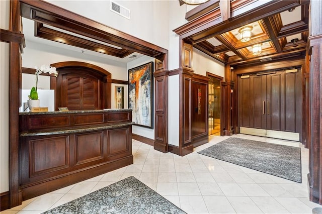 77 Peachtree Pl NE Unit 101, Atlanta, GA 30309 - reception area featuring crown molding, coffered ceiling, and beam ceiling