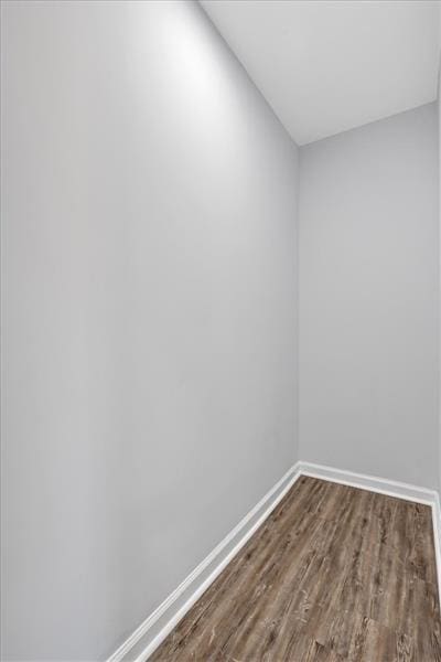 spare room featuring hardwood / wood-style flooring