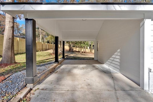 view of parking / parking lot with a carport