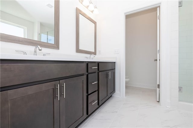 full bath featuring a freestanding bath, a stall shower, toilet, marble finish floor, and recessed lighting