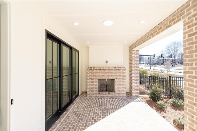 view of patio / terrace featuring fence