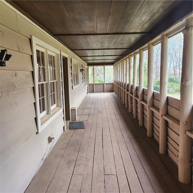 582 S Cherokee Rd, Social Circle, GA 30025 - unfurnished sunroom featuring wood ceiling