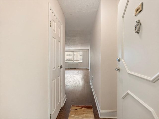 2479 Peachtree Rd NE Unit 407, Atlanta, GA 30305 - corridor featuring hardwood / wood-style flooring and baseboards