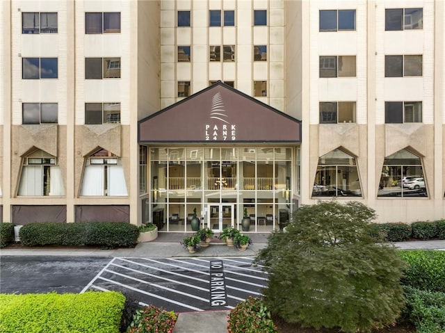 2479 Peachtree Rd NE Unit 407, Atlanta, GA 30305 - view of apartment building / complex with uncovered parking