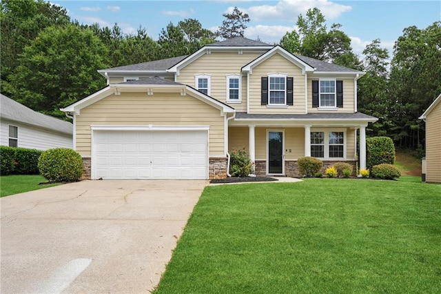 2840 Brookford Ln SW, Atlanta, GA 30331 - view of front facade with driveway, a garage, a front lawn, and stone siding