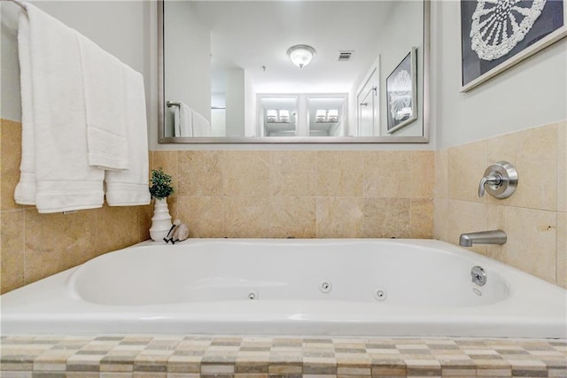 bathroom with a washtub