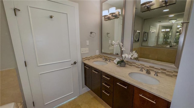 bathroom with vanity and backsplash