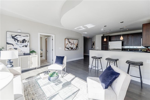 living room with dark hardwood / wood-style floors