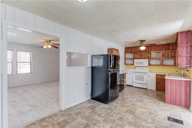 kitchen with a ceiling fan, light countertops, white appliances, and visible vents