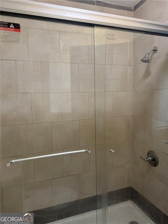 5770 Satterfield Dr, Macon, GA 31206 - full bathroom featuring a stall shower