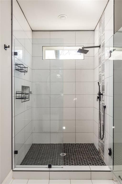 full bathroom with a stall shower