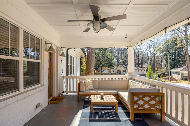 exterior space with plenty of natural light and a ceiling fan