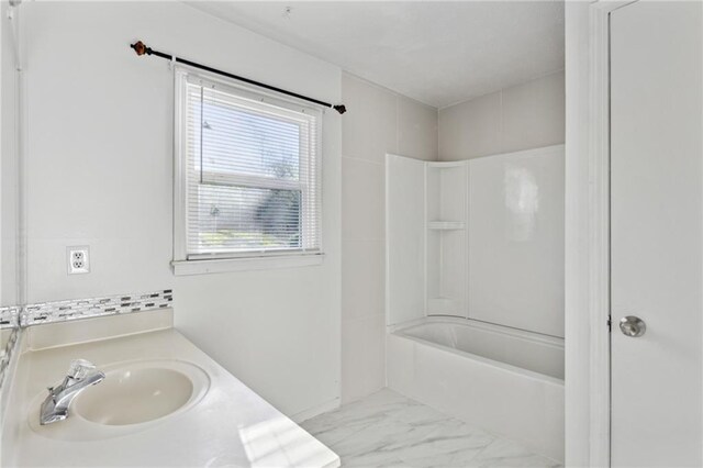 bathroom with vanity, shower / bath combination, and tile patterned flooring