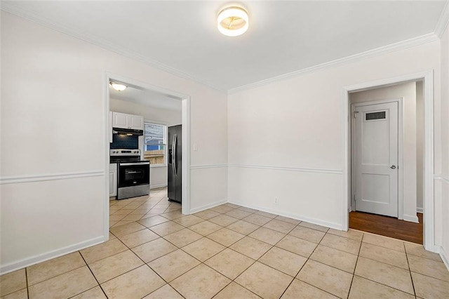 3723 Glenwood Rd, Decatur, GA 30032 - spare room with light tile patterned floors, crown molding, and baseboards